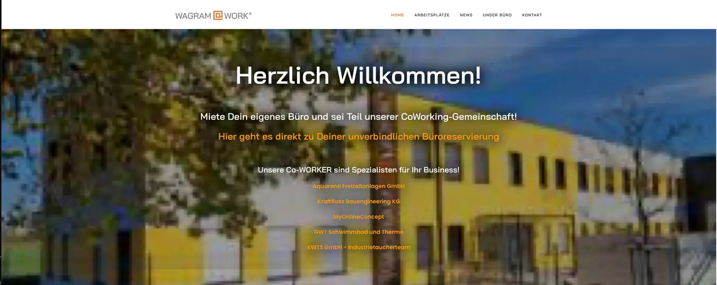 Alte Startseite von Wagram@Work mit unscharfem Foto des Gebäudes und der Überschrift Herzlich Willkommen